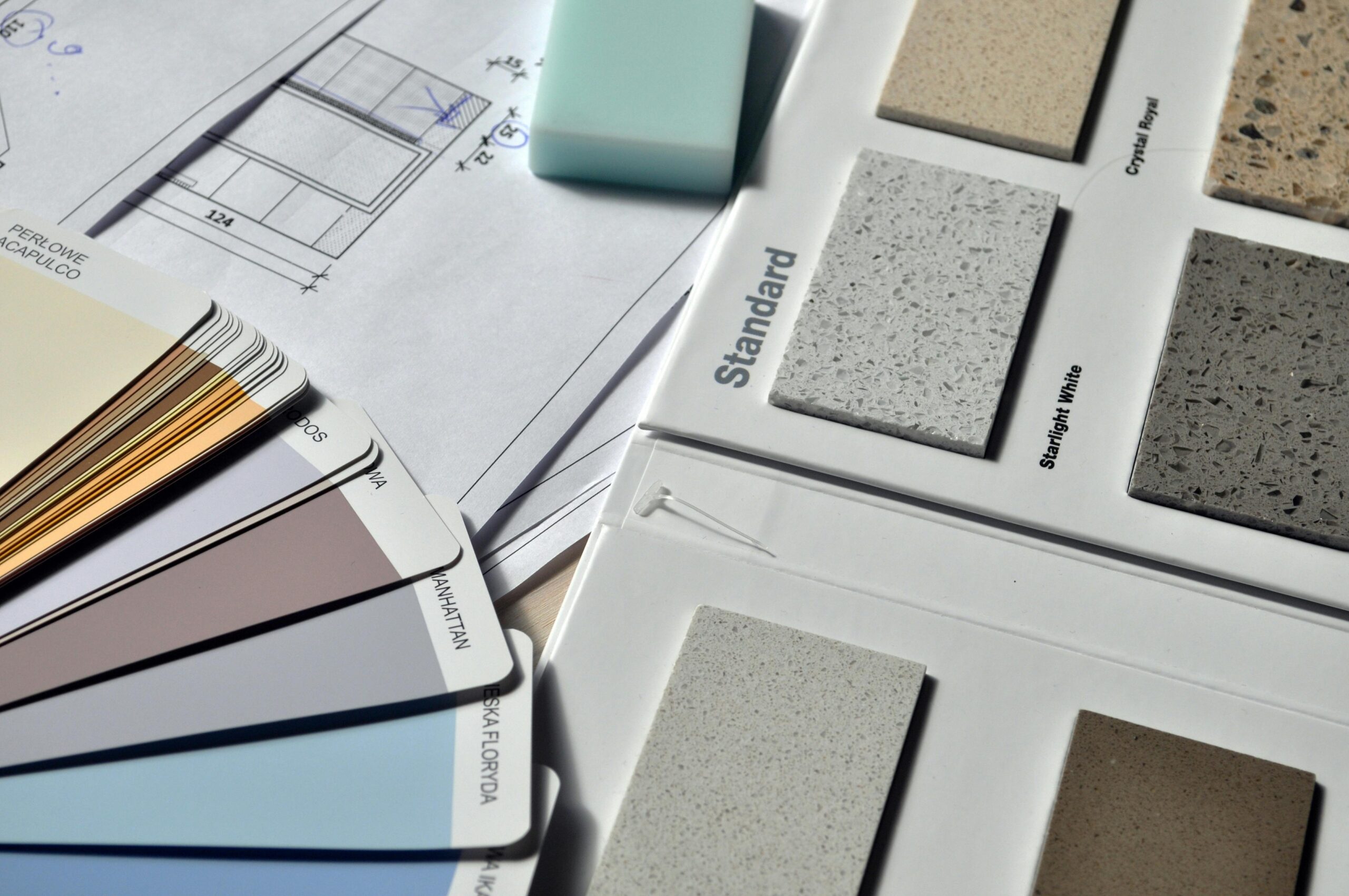 Swatches and Colour Cards all laid out on a table